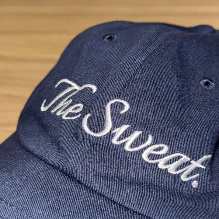 [BUNJANG] The Sweat Cursive Logo Cap Navy / The Sweat 더스웻 커시브 로고 캡 네이비
