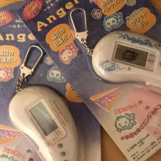 [BUNJANG] Kitty Tamagotchi Angelscope Game Console / 레어! 1997년 일본 고전 다마고치 엔젤스코프 게임기 키티 똥사이즈