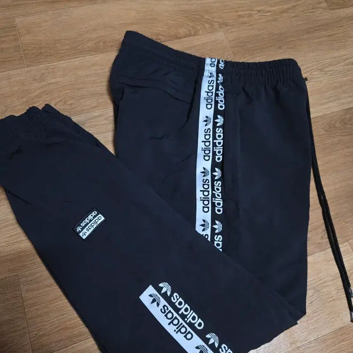 [BUNJANG] Adidas Embroidered Tape Line Track Jogger Pants / 아디다스 자수 테이프라인 트랙 조거팬츠