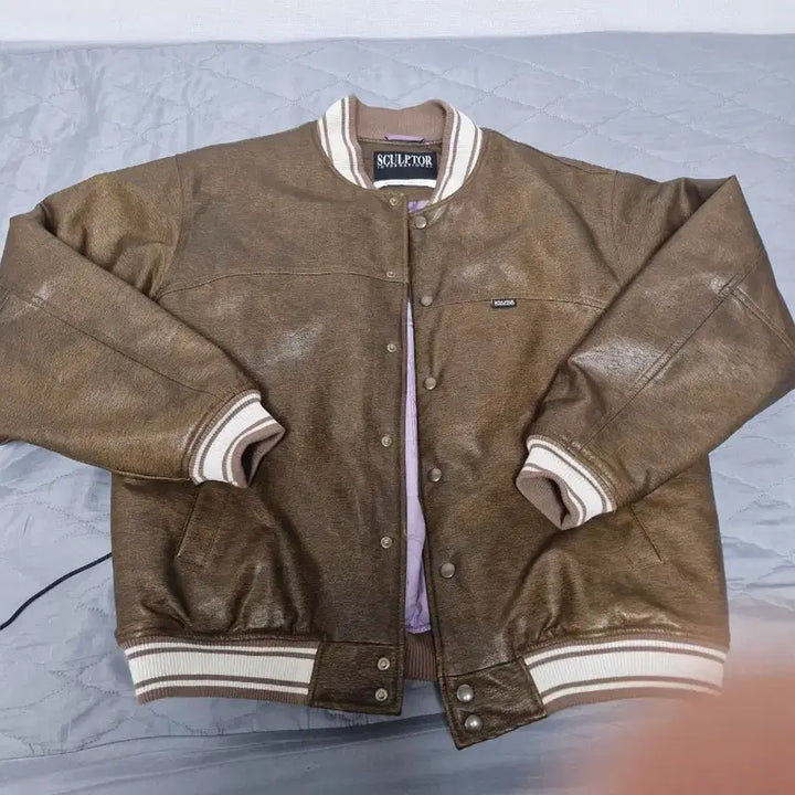 [BUNJANG] Sculptor Leather Varsity Jacket Brown / 스컬프터 레더 바시티 자켓 브라운