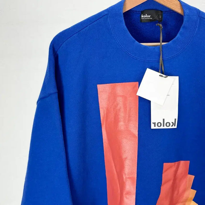 [BUNJANG] K Graphic Gradient Sweatshirt / 컬러 23aw k 그래픽 풀 오버 그라데이션 스웨트 셔츠