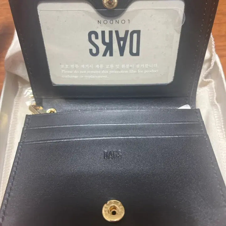 [SOLD OUT] 새상품)닥스 블랙 가죽 여성 카드지갑