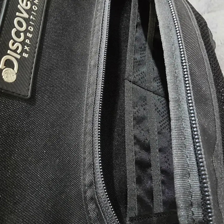 [BUNJANG] Discovery Expedition Black Backpack / 디스커버리 익스페디션 블랙 백팩