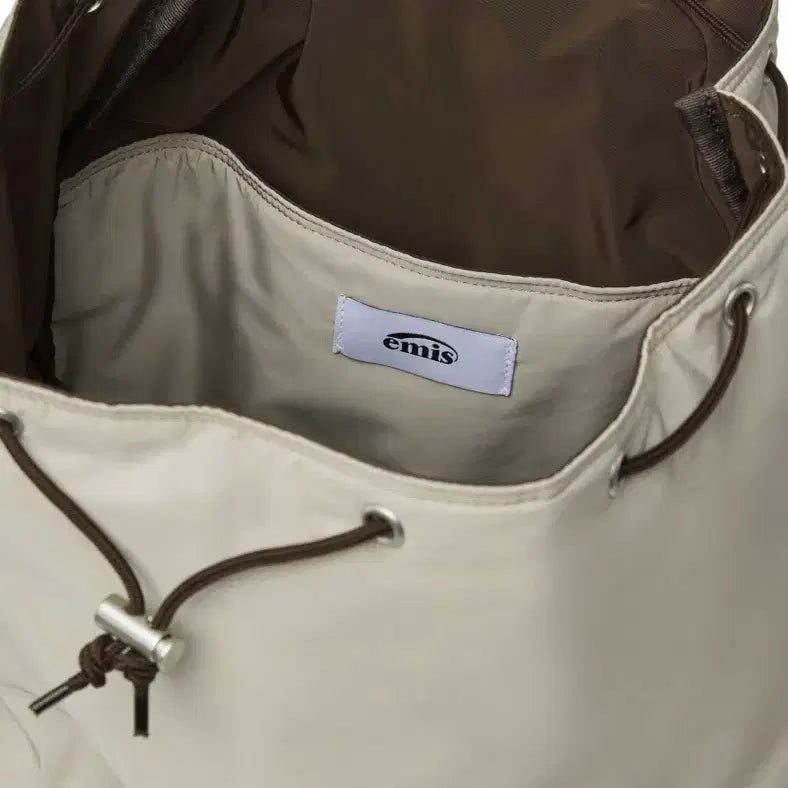 [BUNJANG] EMIS Outline Logo Backpack Beige / [ EMIS ] 이미스 아웃라인 로고 백팩 베이지