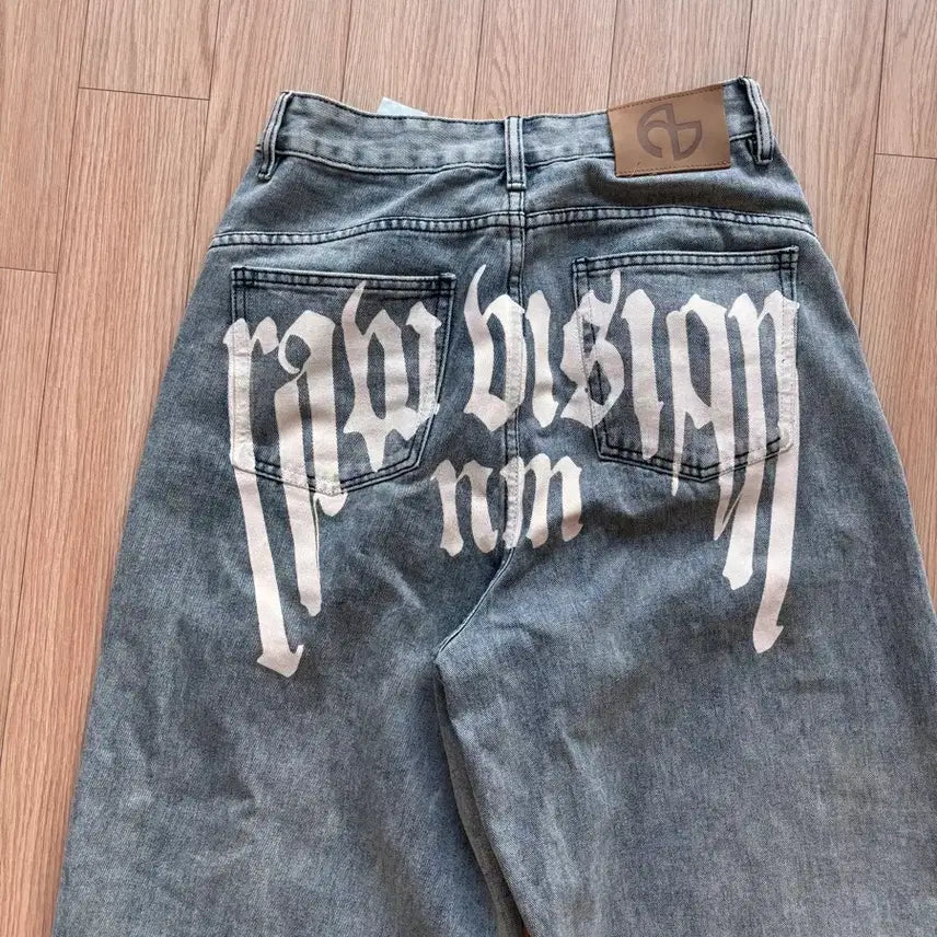 [BUNJANG] Nomanual Lettering Jeans / 노매뉴얼 레터링 청바지