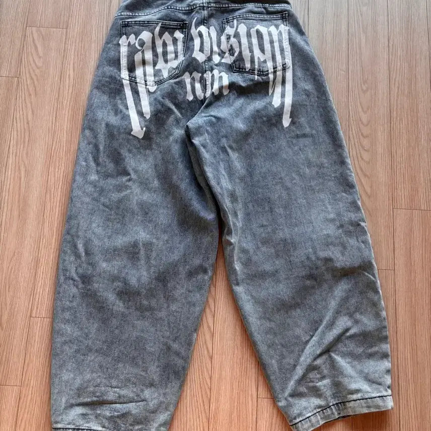 [BUNJANG] Nomanual Lettering Jeans / 노매뉴얼 레터링 청바지