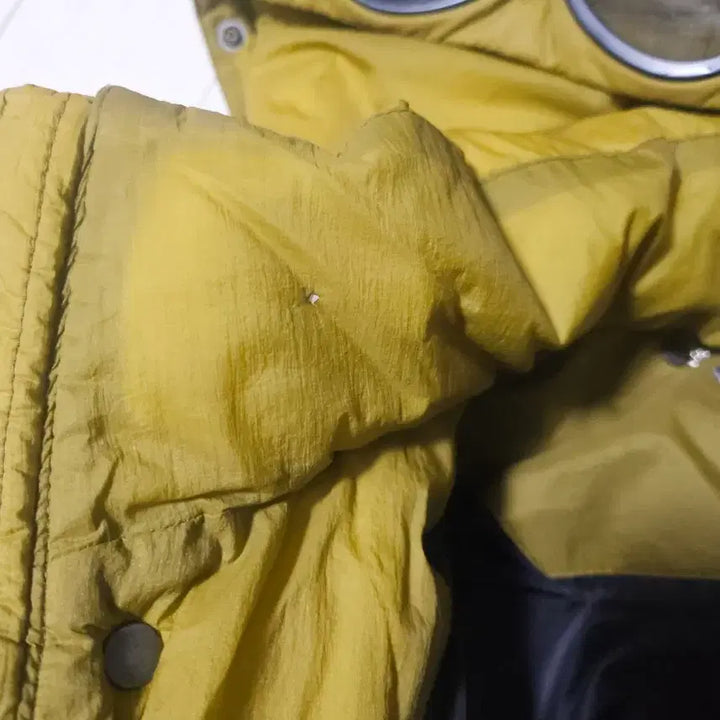 [BUNJANG] CP Company Goggle Lens Hooded Padded Vest / [95]CP컴퍼니 고글 렌즈 후드 패딩 조끼