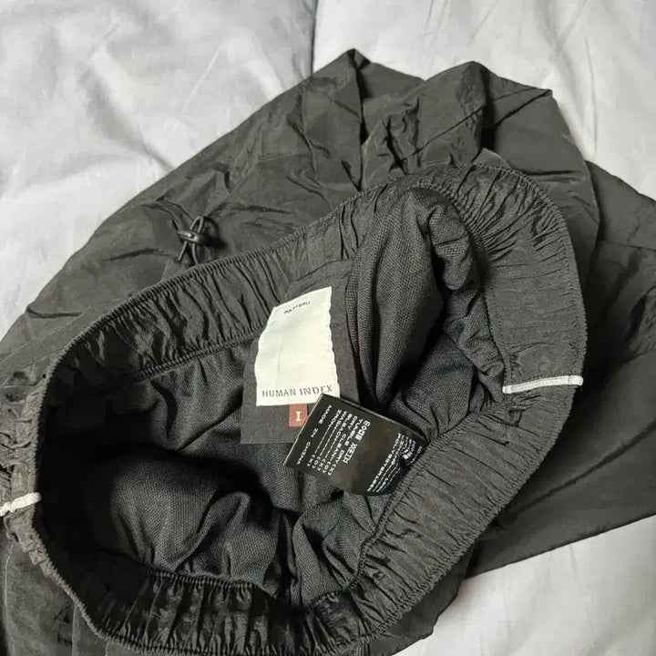 [BUNJANG] Polytelu Human Index Track Pants Black White / 1 폴리테루 휴먼인덱스 트랙 팬츠 블랙 화이트