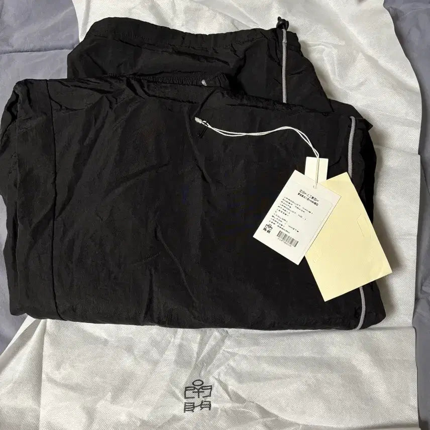 [BUNJANG] Polytelu Human Index Track Pants Black White / 1 폴리테루 휴먼인덱스 트랙 팬츠 블랙 화이트