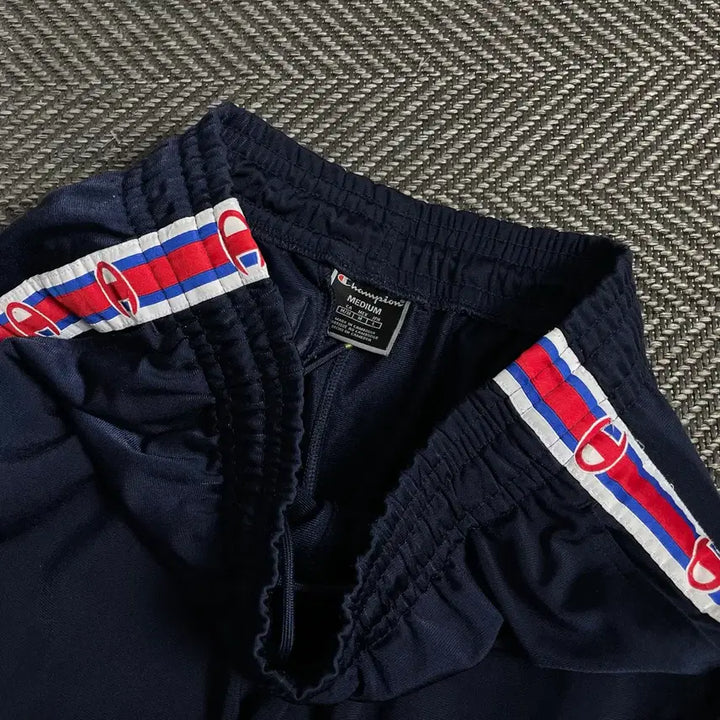 [BUNJANG] Champion Side Spellout Navy Track Pants / 챔피온 일판 사이드 스펠아웃 네이비 트랙 팬츠y 4544