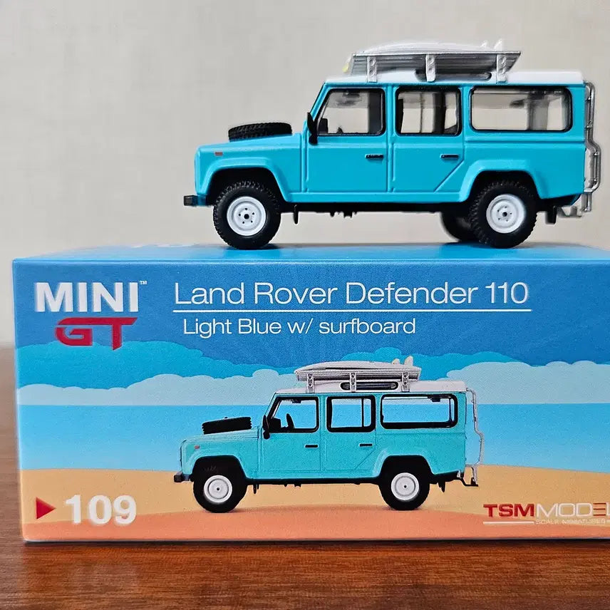 [BUNJANG] Mini GT Land Rover Defender 109 Light Blue Surfing Board / 미니지티 랜드로버 디펜더 109 라이트블루 서핑보드