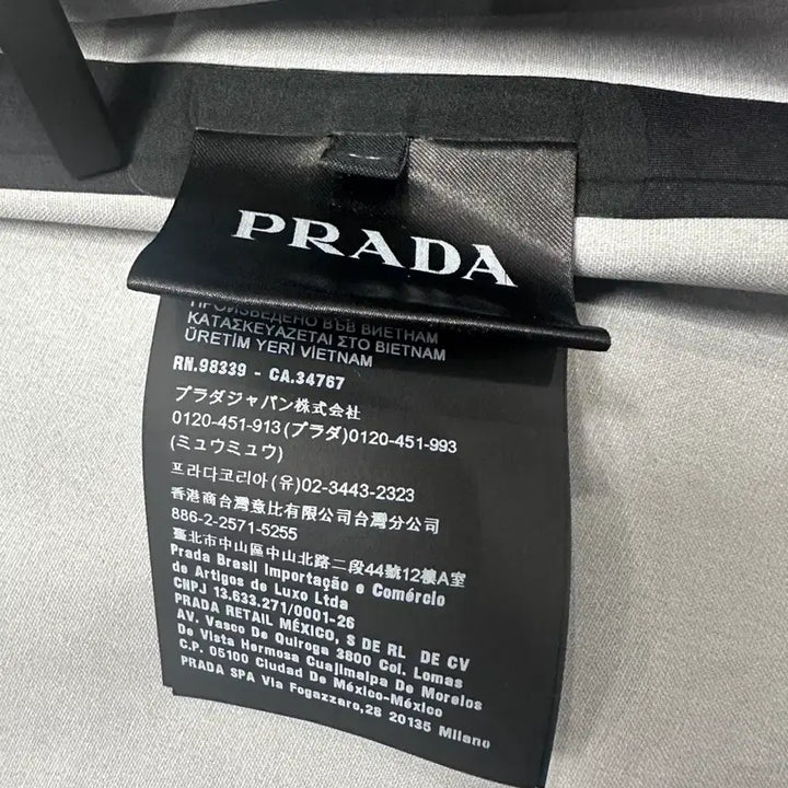 [BUNJANG] Prada Bomber Jacket Triangle Logo Windbreaker Jacket / 프라다 봄버 자켓 삼각로고 바람막이 자켓 50