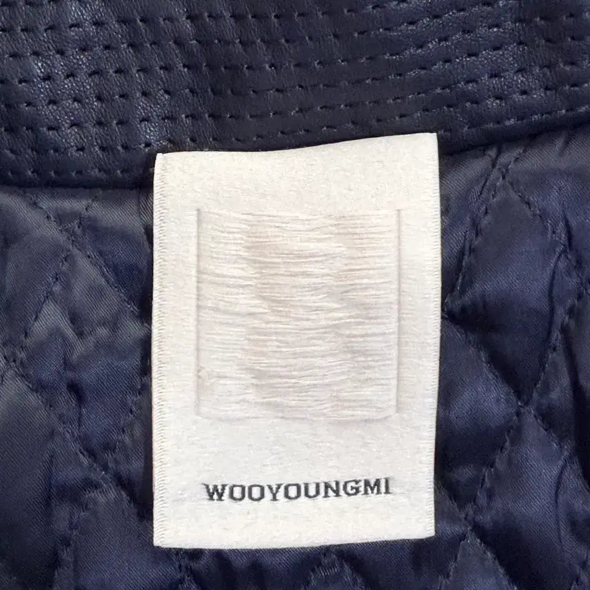 [BUNJANG] WOOYOUNGMI Geometric Quilted Lambskin Leather Jacket / WOOYOUNGMI 솔리드옴므 기하학 입체 퀼팅 램스킨 레더 자켓