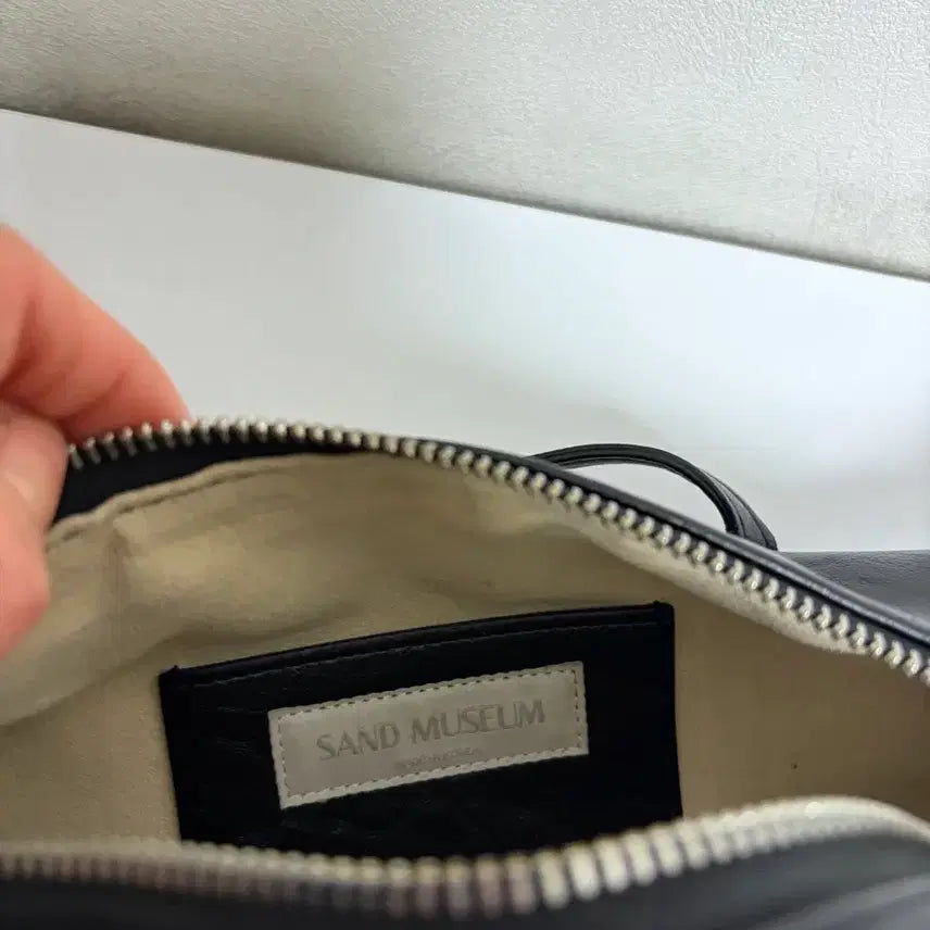 [BUNJANG] Sand Museum Buckle Pocket Baguette Bag / 샌드뮤지엄 버클 포켓 바게트백