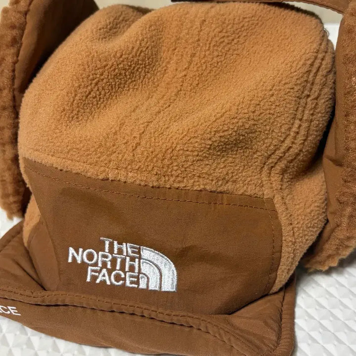 [BUNJANG] The North Face Earflap Cap Camel Hat / 노스페이스 화이트라벨 이어머프캡 카멜 군밤장수모자