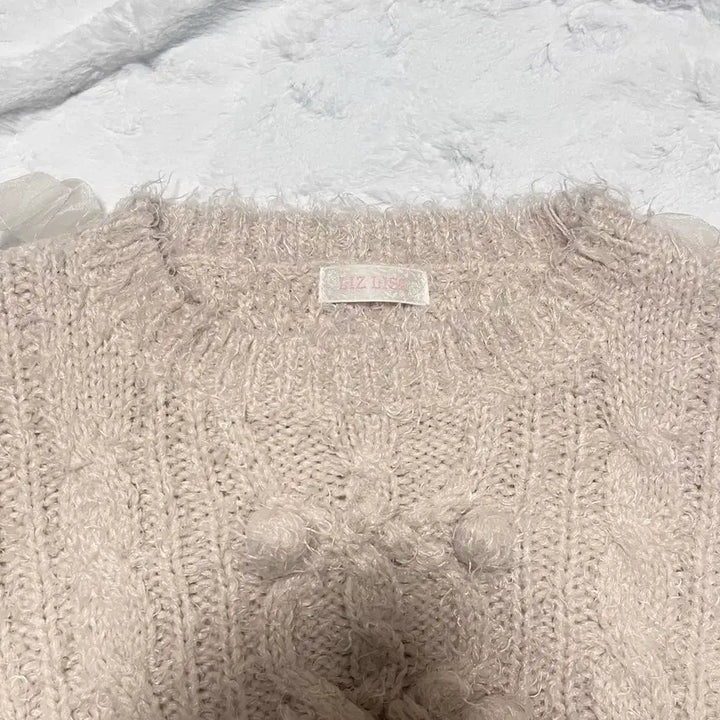 [BUNJANG] Liz Lisa Beige Pom-Pom Ribbon Knit Top / 리즈리사 연베이지 폼폼이 리본 니트