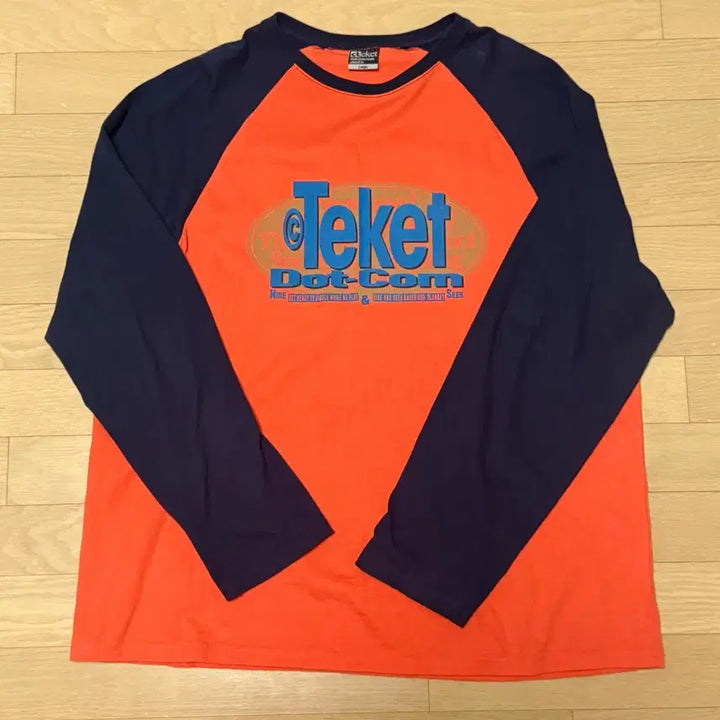 [SOLD OUT] L) 테켓 롱슬리브 오렌지 Doorbell L/S Tee