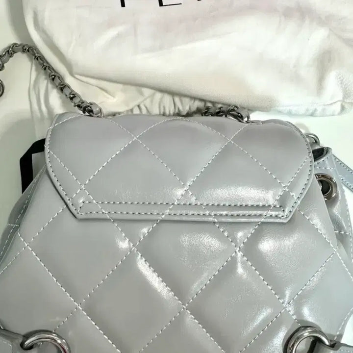 [BUNJANG] FERIA Quilted Chain Backpack - Fog Blue / FERIA 퀼팅 체인 백팩 안개 블루
