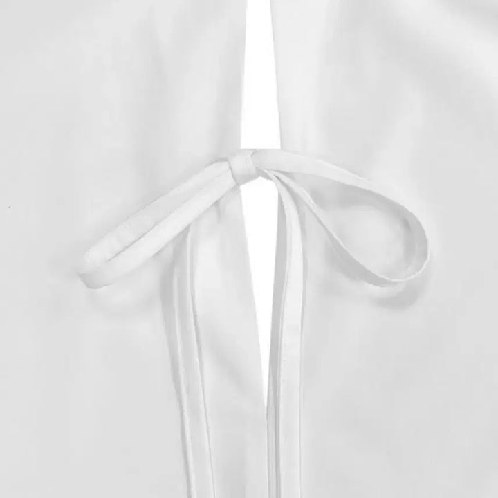 [SOLD OUT] 옷장 정리 트리밍버드 스텝 헴라인 롱 스트랩 셔츠 블랙