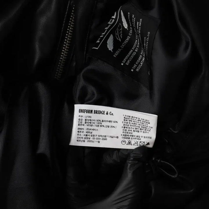 [BUNJANG] Uniform Bridge Leather Shelter Duck Down Padded Jacket / 유니폼브릿지 23FW 덕다운  레더 쉘터 가죽 패딩