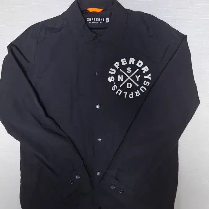 [SOLD OUT] 슈퍼드라이 서플러스 굿즈 코치자켓 100 바람막이