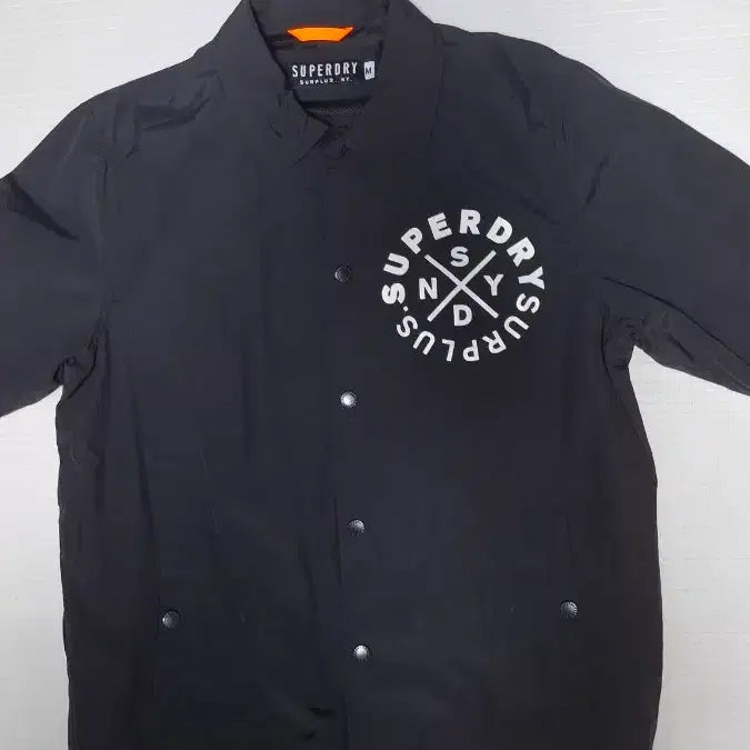 [SOLD OUT] 슈퍼드라이 서플러스 굿즈 코치자켓 100 바람막이