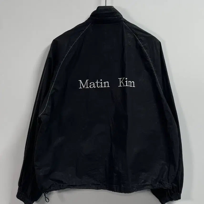 [BUNJANG] Matinkim Spell Out Coated Windbreaker / 마땡킴 스펠아웃 코팅 바람막이 (on.626)