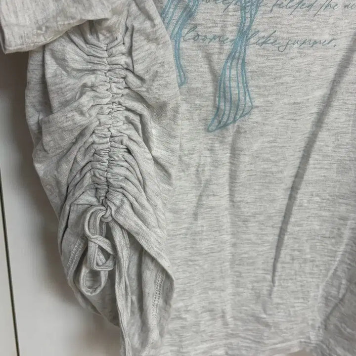 [BUNJANG] Illygo Ribbon Shirring Off-Shoulder T-Shirt / 일리고 리본 셔링 오프숄더 티셔츠 백멜란지