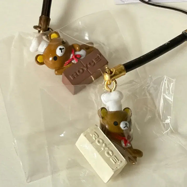 [SOLD OUT] 일괄 리락쿠마 카페 요리사 초콜릿 스트랩 키링 2종