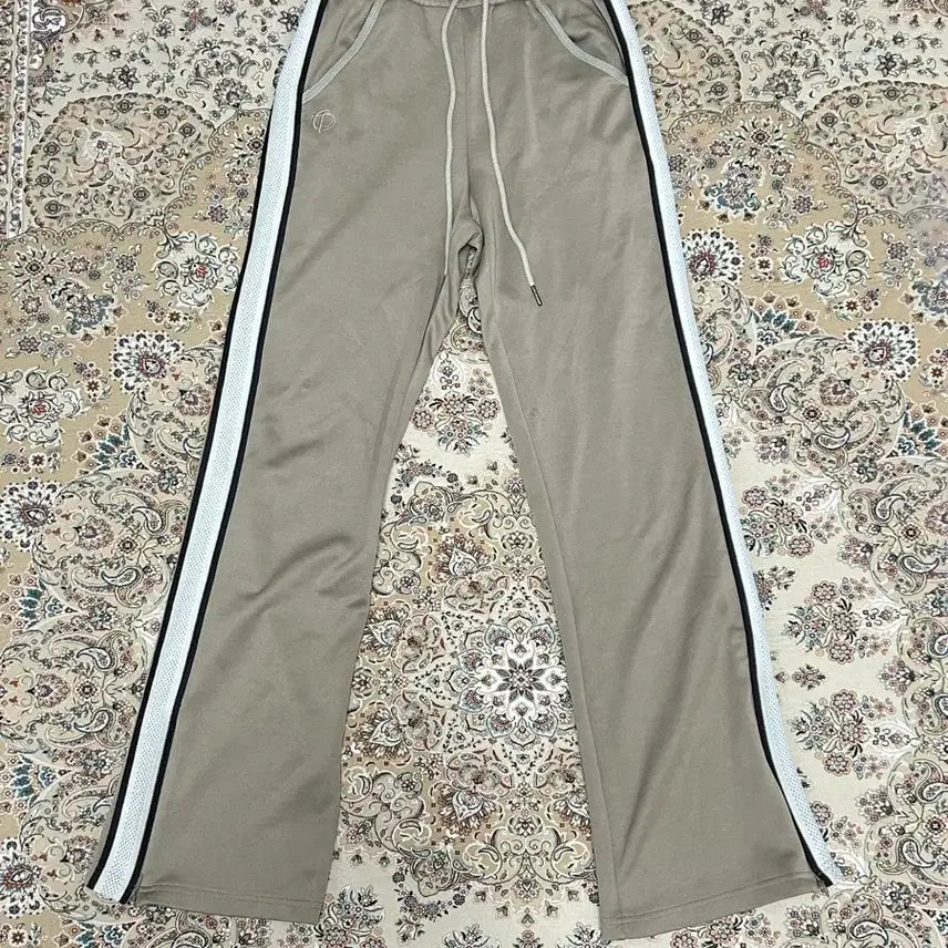 [BUNJANG] TheOpen Product Taped Jersey Track Pants Beige / 더오픈프로덕트 테이프드 저지 트랙팬츠 베이지1