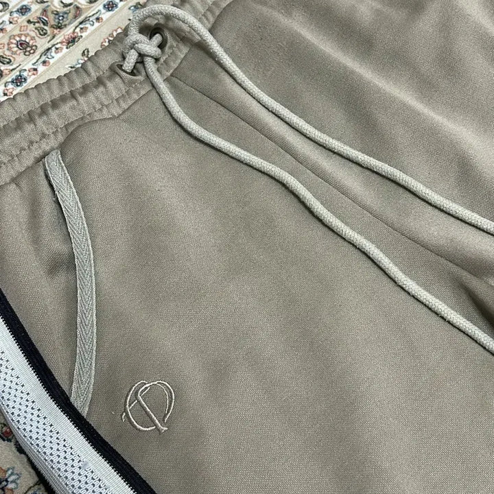 [BUNJANG] TheOpen Product Taped Jersey Track Pants Beige / 더오픈프로덕트 테이프드 저지 트랙팬츠 베이지1