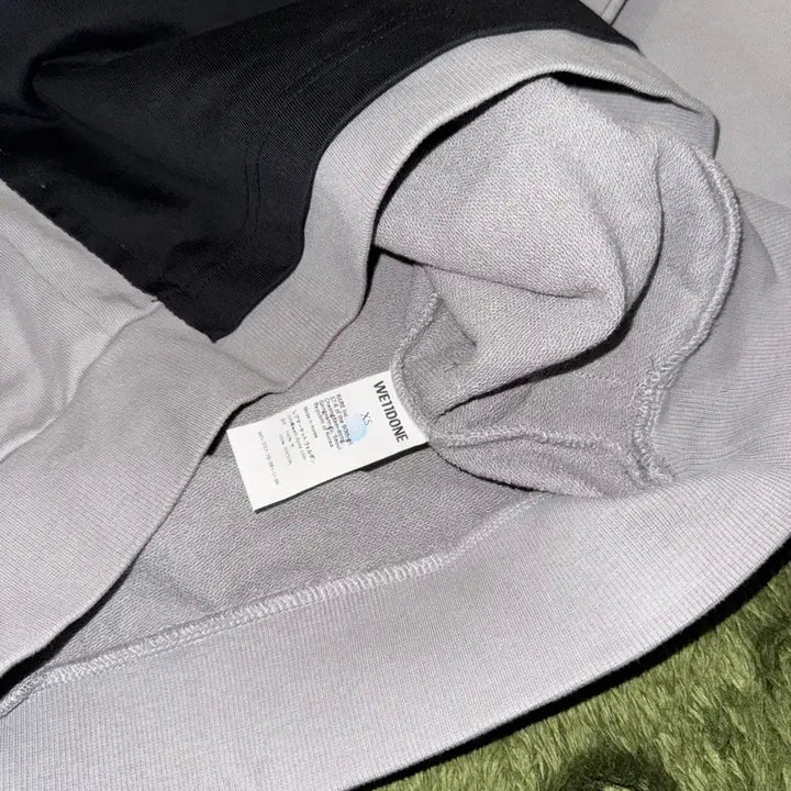 [BUNJANG] We11done Oversized Overlay Panel Logo Hoodie / We11done 웰던 오버사이즈드 오버레이 패널 로고 후디