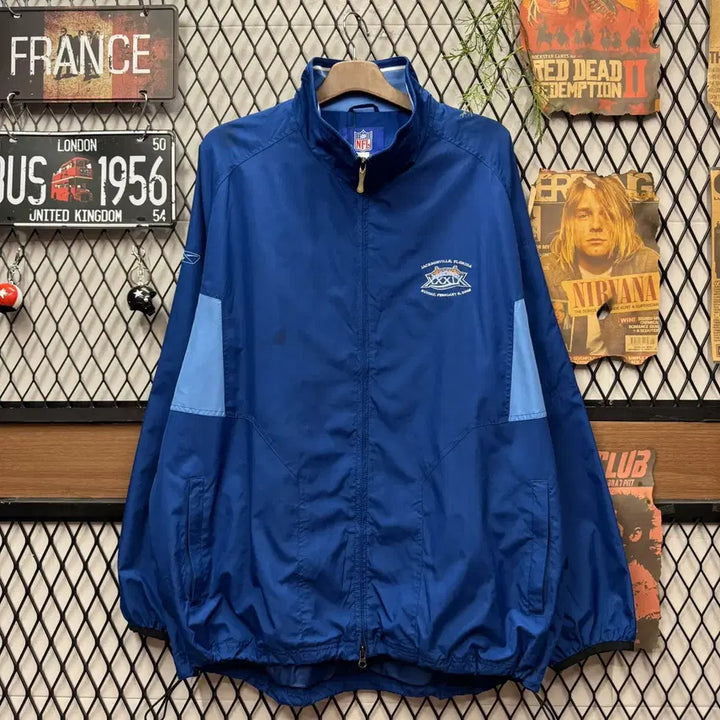 [BUNJANG] Reebok NFL Super Bowl Windbreaker Jacket / 00s 리복 X NFL 39회 슈퍼볼 바람막이 후면 로고 포인트 블루