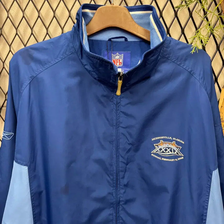[BUNJANG] Reebok NFL Super Bowl Windbreaker Jacket / 00s 리복 X NFL 39회 슈퍼볼 바람막이 후면 로고 포인트 블루