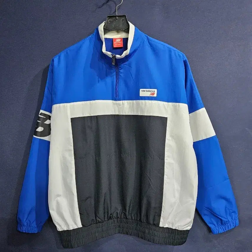 [SOLD OUT] 뉴발란스 프린팅 배색 남성 오버핏 105 반집업 바람막이