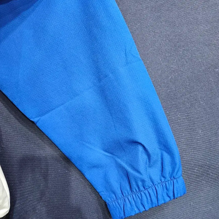 [SOLD OUT] 뉴발란스 프린팅 배색 남성 오버핏 105 반집업 바람막이