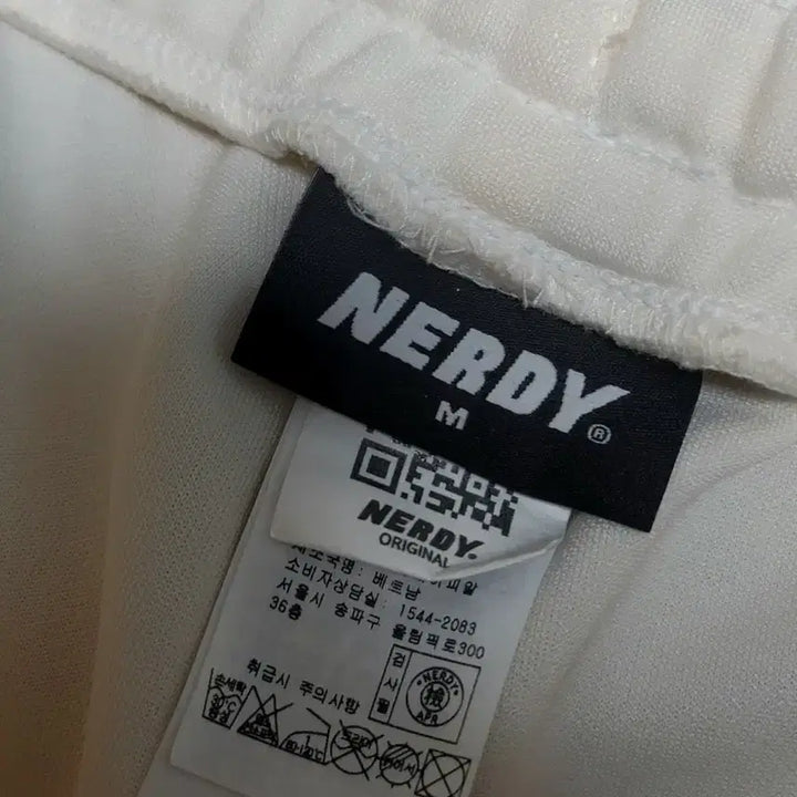 [BUNJANG] Nerdy Symbol Pattern Track Pants Cream M / 널디 Symbol 패턴 트랙 팬츠 크림 M