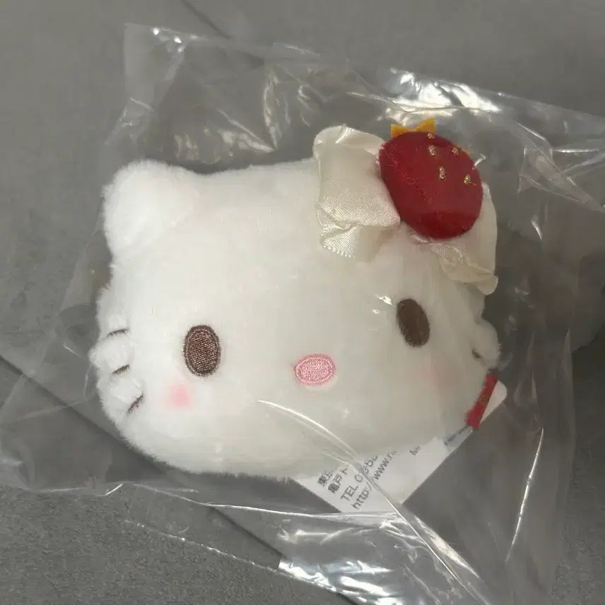 [BUNJANG] Sanrio Hello Kitty Sweet Cake Face Pouch / 산리오 스위트케이크 헬로키티 얼굴파우치 미개봉 새상품