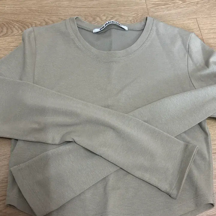 [BUNJANG] Black Up Mosaque Rounding Cropped Long Sleeve T-Shirt Khaki / 블랙업 모자크 라운딩 크롭 긴팔 티셔츠 카키
