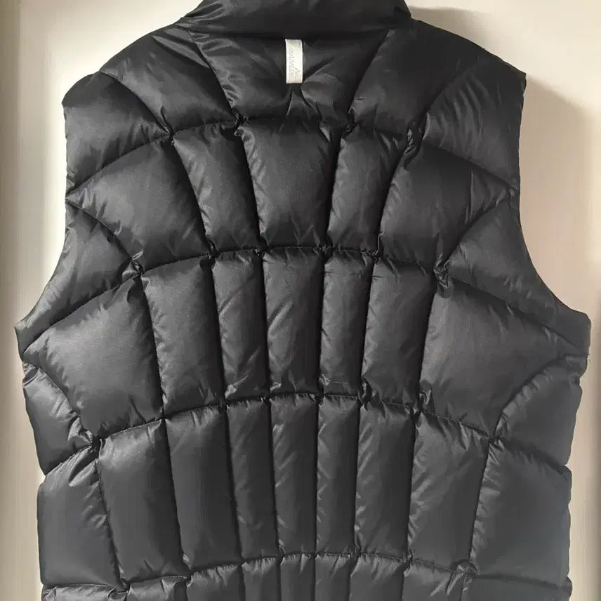 [SOLD OUT] 노매뉴얼 STITCHED SYMBOL PADDING VEST