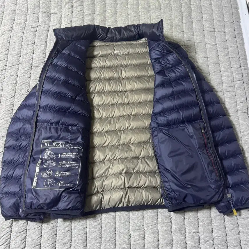 [BUNJANG] TUMI Pax Charlotte Packable Lightweight Padded Jacket / 투미 TUMI 팍스 샬롯 패커블 경량패딩