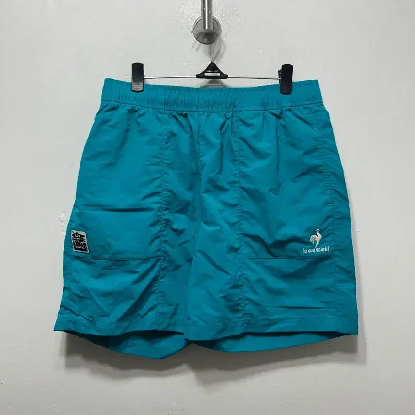 [BUNJANG] Le Coq Sportif Emerald Shorts 85 / 르꼬끄 스포르티브 반바지 에메랄드 85