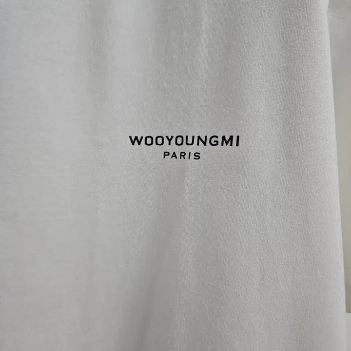 [BUNJANG] Wooyoungmi Back Logo Flower Short Sleeve T-shirt / 우영미 백로고 플라워 반팔티 48