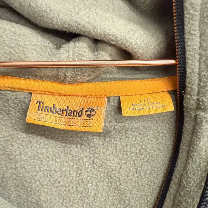 [BUNJANG] Timberland Small Logo Khaki Fleece Half-Zip Hoodie / 팀버랜드 하프집업 스몰로고 카키 기모 후드티 (L)