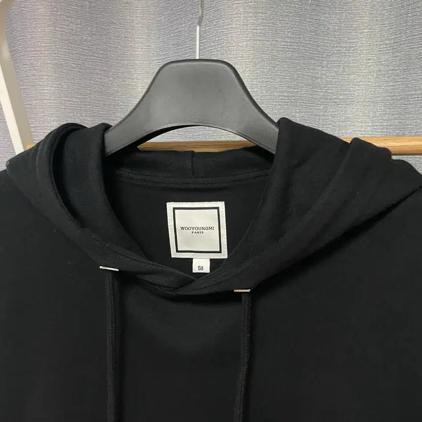 [BUNJANG] Wooyoungmi Flower Back Logo Hoodie / [ 50 ] 우영미 플라워 백로고 프린팅 후드티