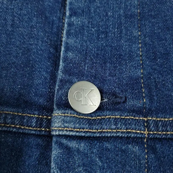 [BUNJANG] Calvin Klein Jeans Mid-Wash Oversized Four-Pocket Trucker Denim Jacket / 캘빈클라인 진스 중청워싱 오버핏 포포켓 워크웨어 트러커 데님자켓 청자켓