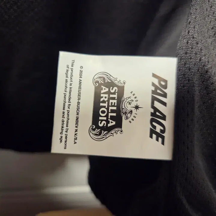 [BUNJANG] Palace Stella Artois Light Coat Jacket (Black) / 팔라스 스텔라 아르투아 라이트 코트 자켓 블랙 판매합니다.