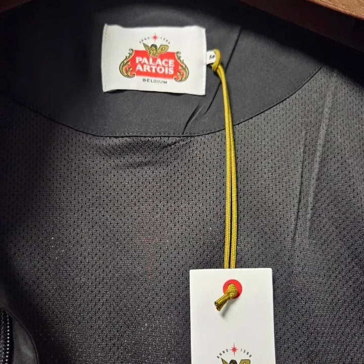 [BUNJANG] Palace Stella Artois Light Coat Jacket (Black) / 팔라스 스텔라 아르투아 라이트 코트 자켓 블랙 판매합니다.