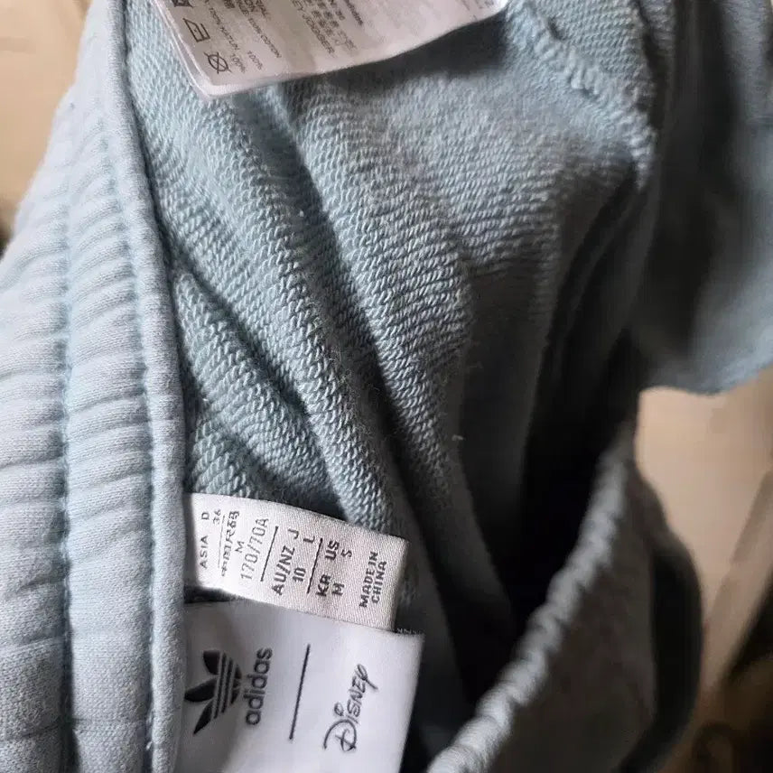 [BUNJANG] Adidas Disney Collaboration Training Pants Sky Blue / 아디다스 디즈니 콜라보 트레이닝 바지 하늘색