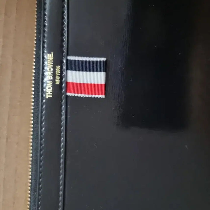 [BUNJANG] Thom Browne Glossy Black Calf Leather Clutch Bag with Duck Motif / 톰브라운덕 유광 블랙 카프 레더 클러치